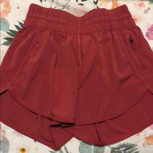 Red/pink lululemon tracker shorts